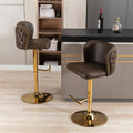 2 Brown Leather Rotating Bar Stools